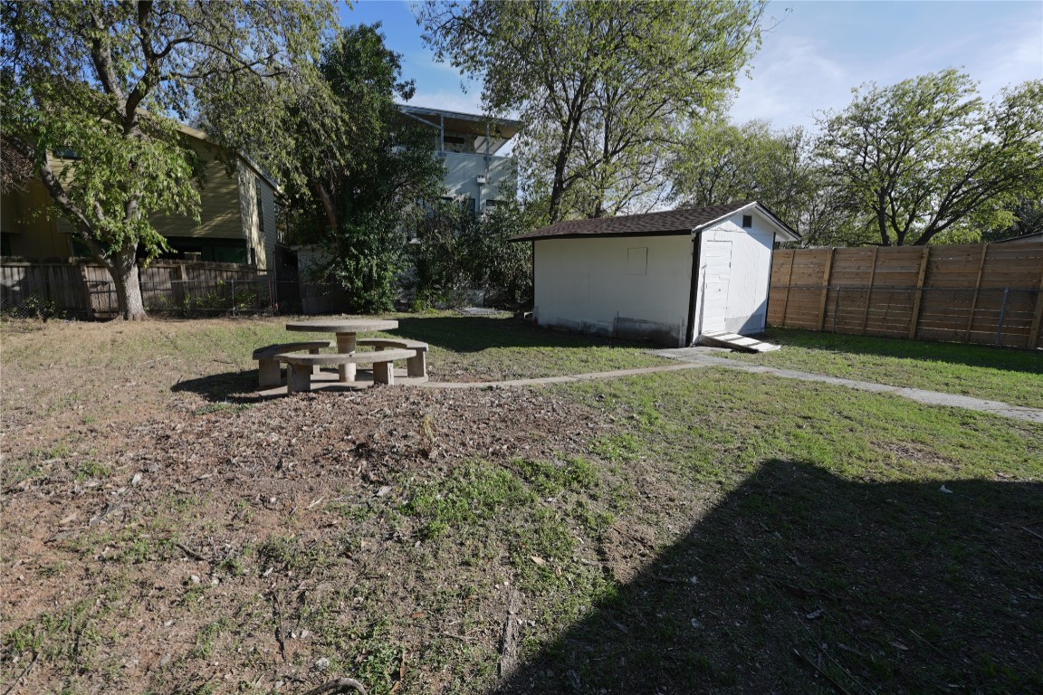2311 South 3rd Street Austin, TX 78704 - Photo 14 of 14 a backyard of a house with yard and outdoor seating