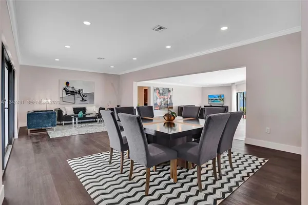 a view of a dining room with furniture