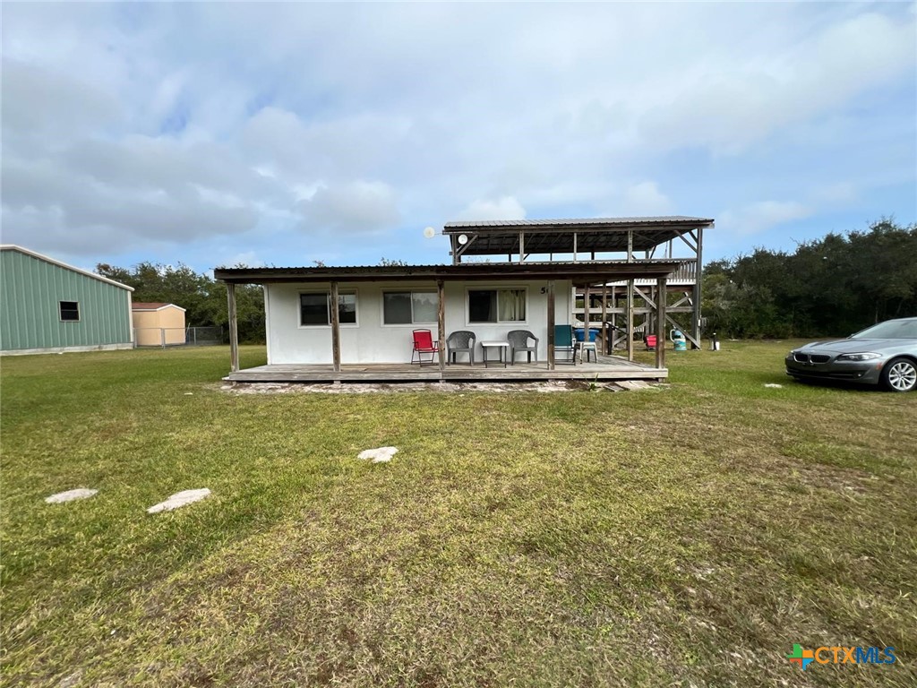 56 Rutherford Street Port O'Connor, TX 77982 - Photo 22 of 37 a view of swimming pool with outdoor seating