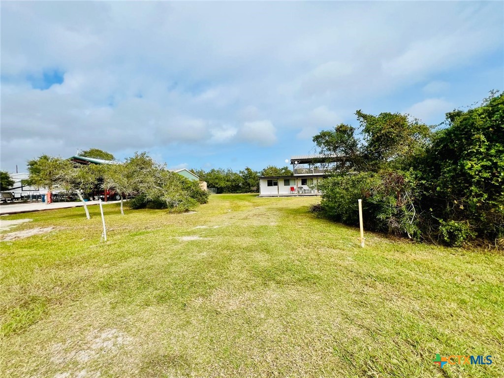 56 Rutherford Street Port O'Connor, TX 77982 - Photo 25 of 37 a view of an outdoor space and swimming pool