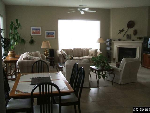 10520 Dillingham Drive Reno, NV 89521 - Photo 5 of 13 a view of a livingroom with furniture and a fireplace