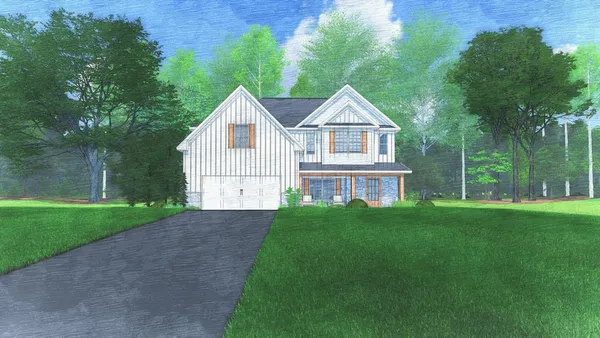 a front view of a house with yard