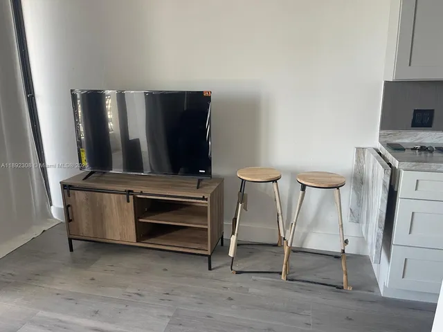 a view of room with furniture