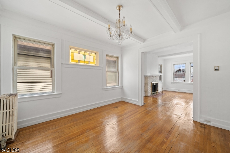116 Berkeley Avenue Bloomfield, NJ 07003 - Photo 6 of 13 a view of livingroom with window