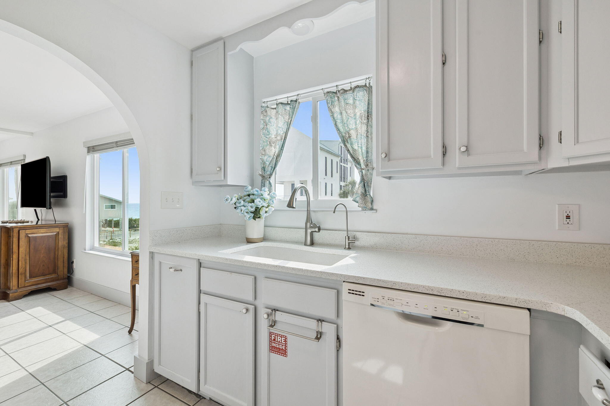 448 West Park Pl Avenue, Unit A2 Inlet Beach, FL 32461 - Photo 12 of 54 a kitchen with a sink cabinets and window