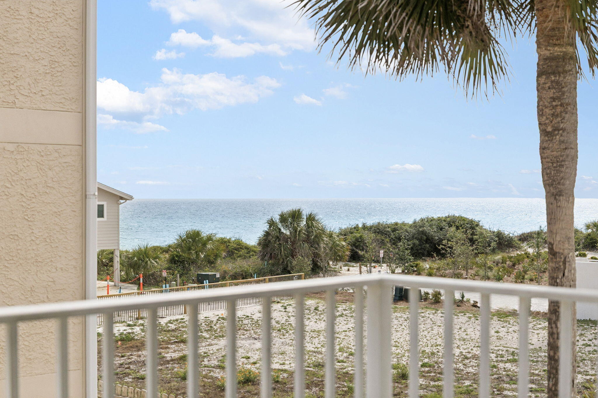 448 West Park Pl Avenue, Unit A2 Inlet Beach, FL 32461 - Photo 19 of 54 a balcony with wooden floor and city view