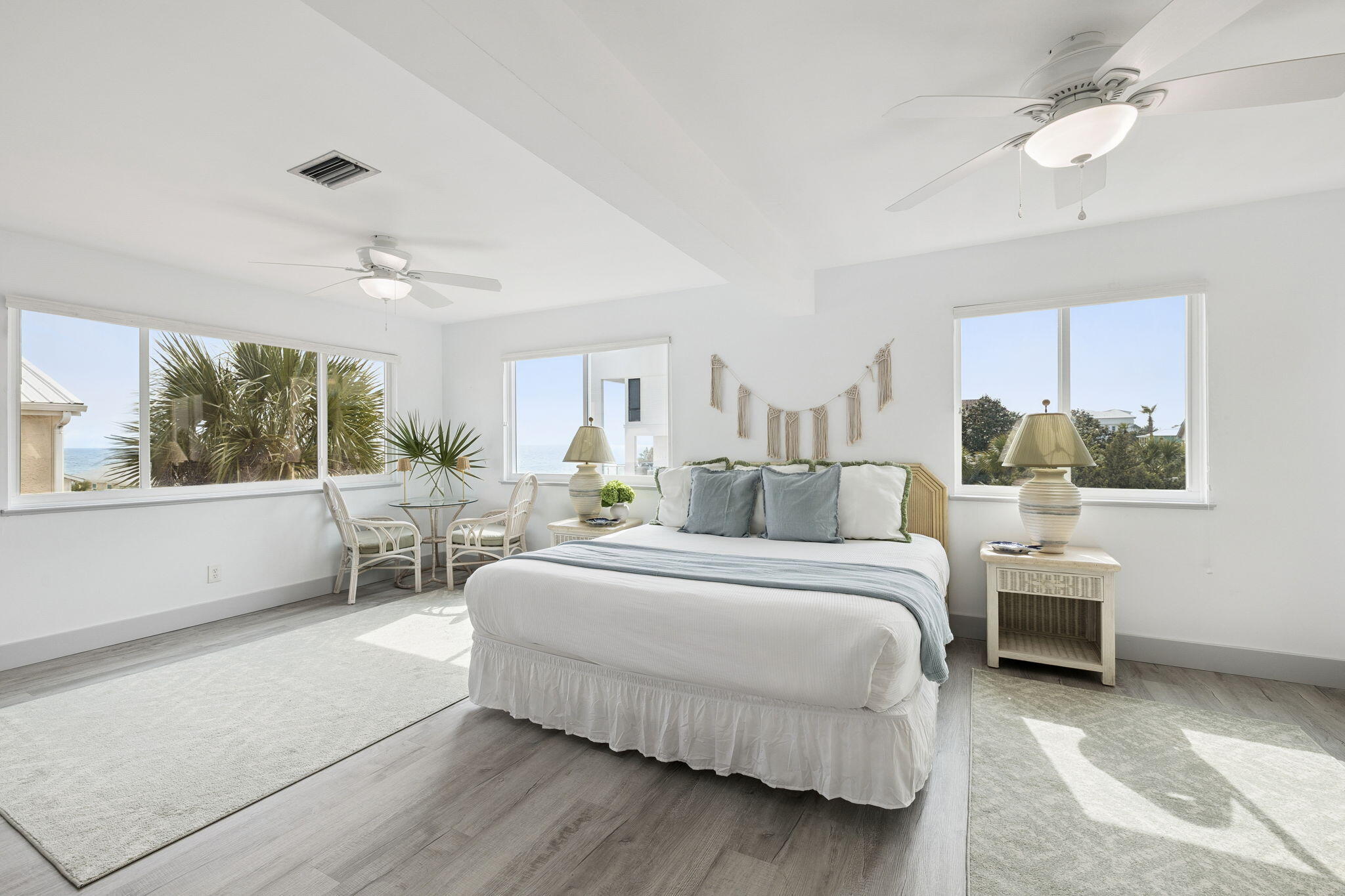 448 West Park Pl Avenue, Unit A2 Inlet Beach, FL 32461 - Photo 22 of 54 a bedroom with a bed and a large window