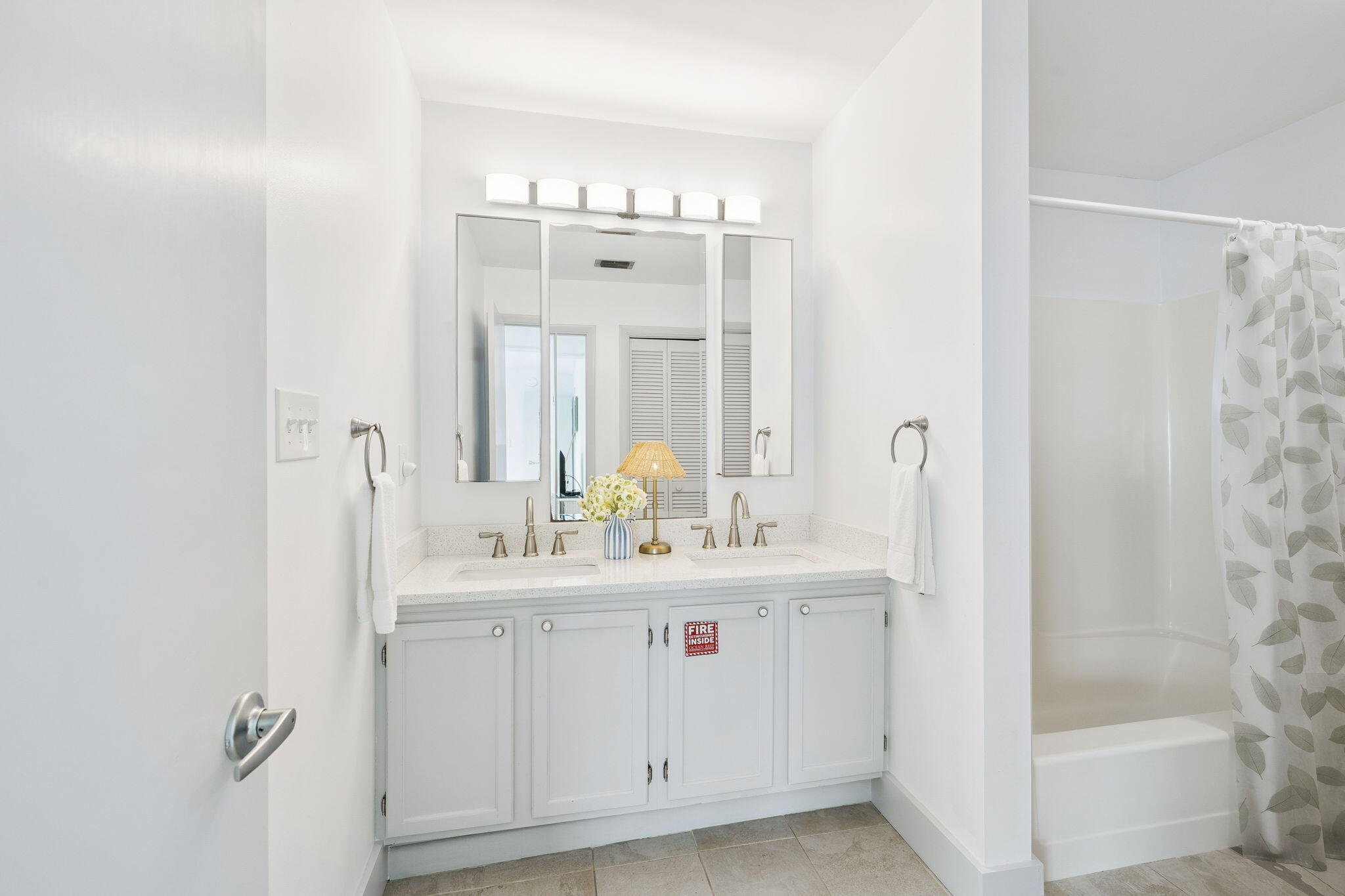 448 West Park Pl Avenue, Unit A2 Inlet Beach, FL 32461 - Photo 24 of 54 a bathroom with a double vanity sink mirror and shower