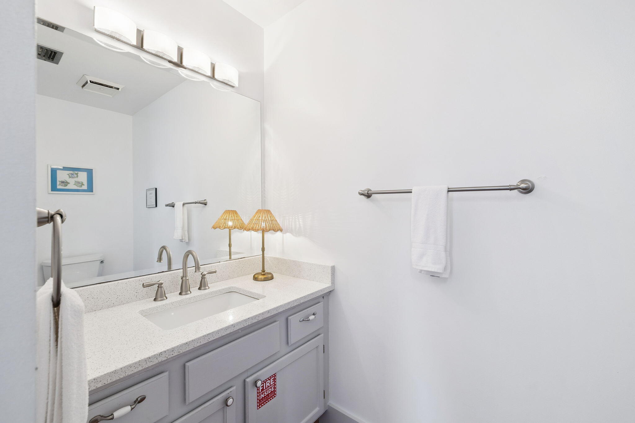 448 West Park Pl Avenue, Unit A2 Inlet Beach, FL 32461 - Photo 32 of 54 a bathroom with a sink and a mirror
