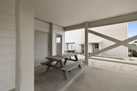 a view of a bench in a patio