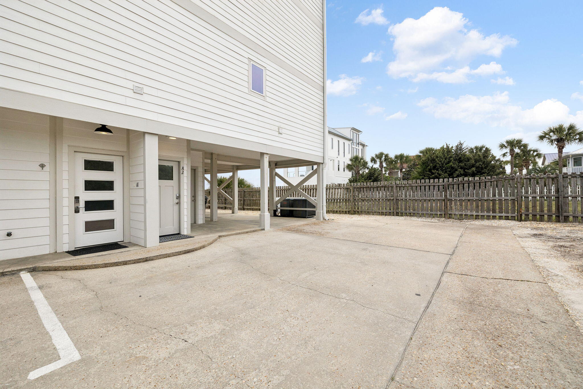 448 West Park Pl Avenue, Unit A2 Inlet Beach, FL 32461 - Photo 38 of 54 a view of a terrace with a basket ball court