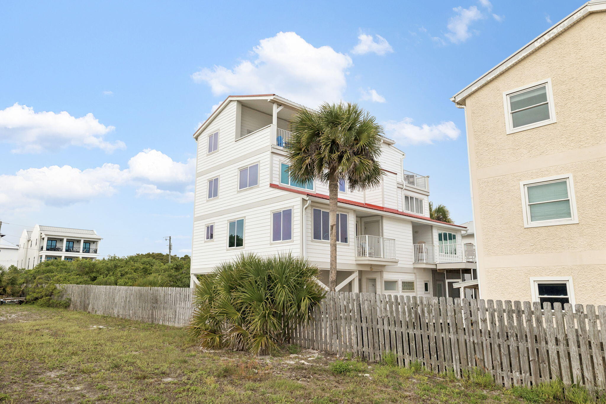 448 West Park Pl Avenue, Unit A2 Inlet Beach, FL 32461 - Photo 45 of 54 a front view of a house with a yard