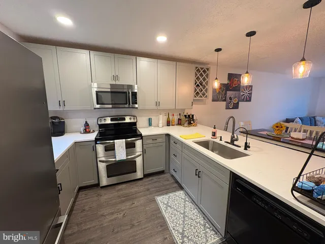 a view of an empty room with a empty space and a window