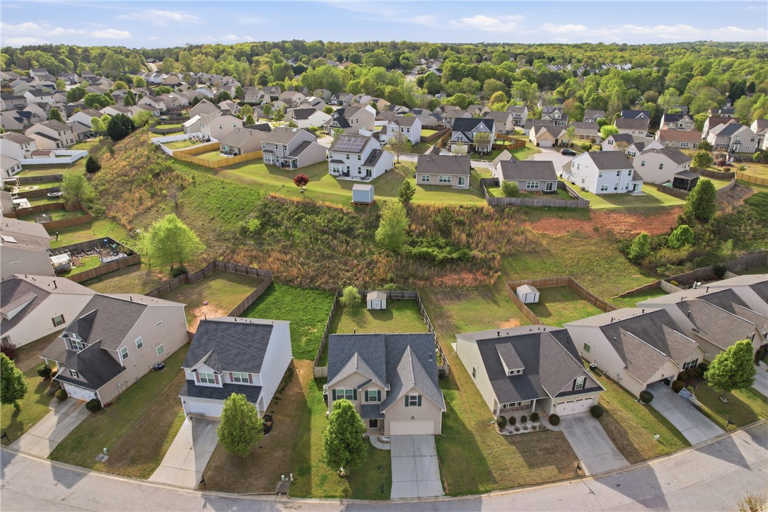347 Riverdale Road Simpsonville, SC 29680 - Photo 28 of 30 An aerial perspective reveals a vibrant neighborhood nestled against a lush, tree-lined landscape.
