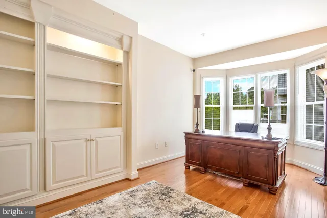 a bathroom with a sink a vanity and a mirror