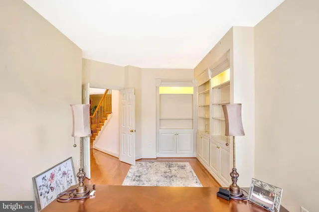 a bathroom with a sink a vanity and a mirror