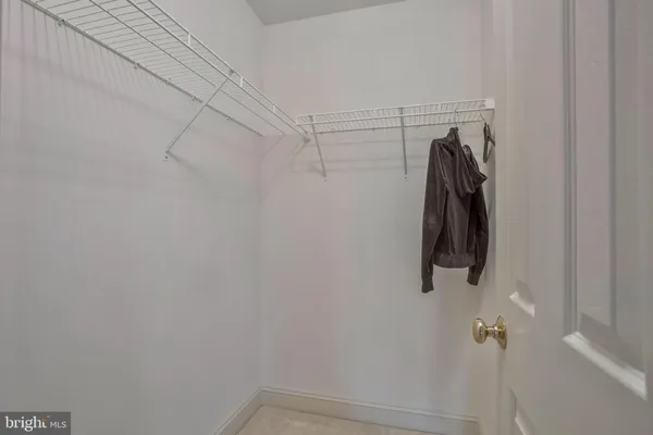 a bathroom with a tub and a sink