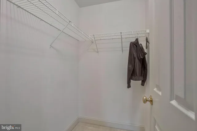 a bathroom with a tub and a sink