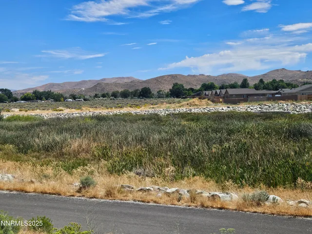 a view of lake with mountain