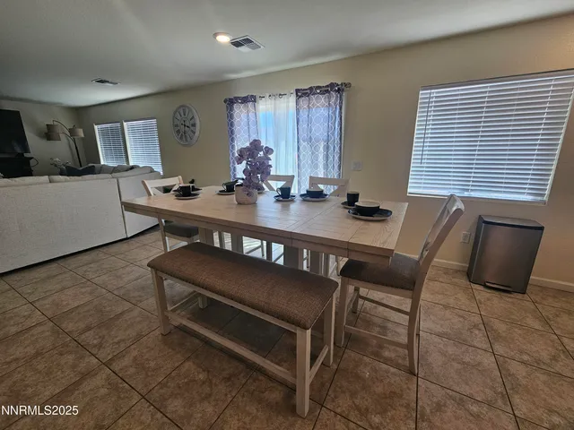 a view of a workspace with furniture