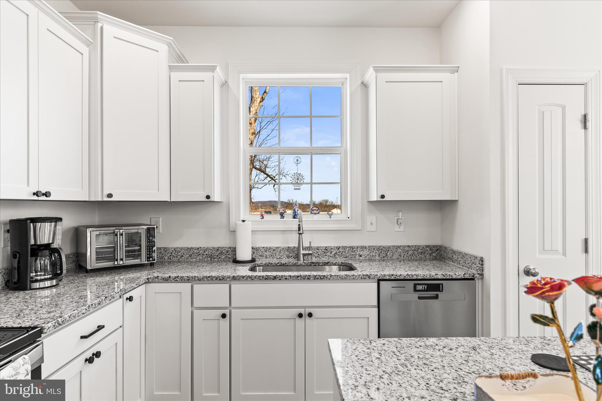 101 Overlook Dr. Hanover, PA 17331 - Photo 12 of 38 a kitchen with granite countertop a sink stove and cabinets