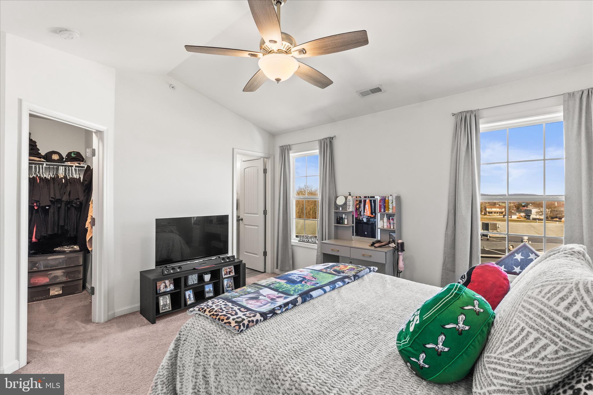 101 Overlook Dr. Hanover, PA 17331 - Photo 20 of 38 a bedroom with a bed and a flat screen tv