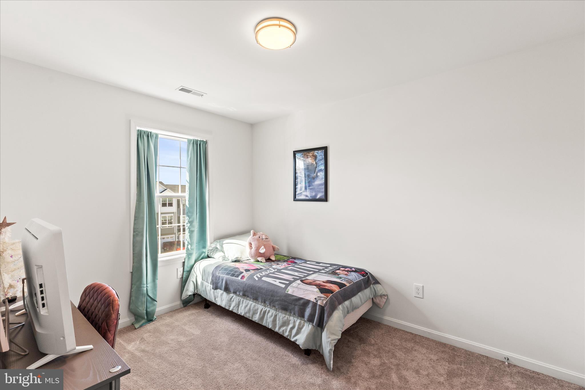 101 Overlook Dr. Hanover, PA 17331 - Photo 26 of 38 a bedroom with a bed and a desk