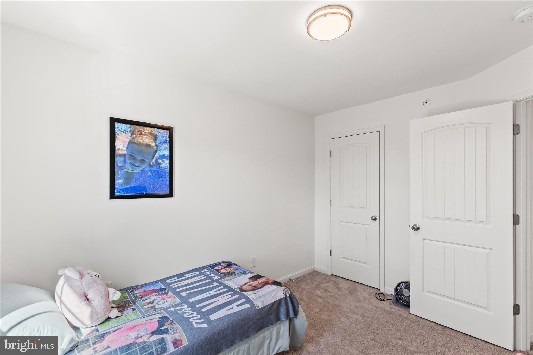 101 Overlook Dr. Hanover, PA 17331 - Photo 27 of 38 a bedroom with a bed and a lamp