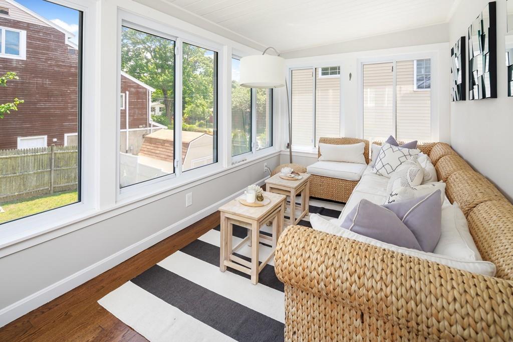5 Beach Lane Hingham, MA 02043 - Photo 13 of 32 a living room with furniture and a large window