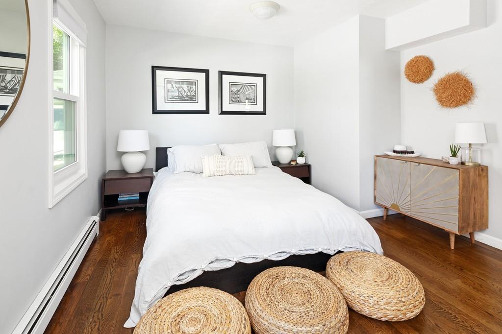 5 Beach Lane Hingham, MA 02043 - Photo 19 of 32 a bedroom with a bed and wooden floor