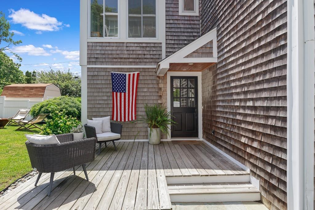 5 Beach Lane Hingham, MA 02043 - Photo 21 of 32 a view of a house with porch and wooden floor