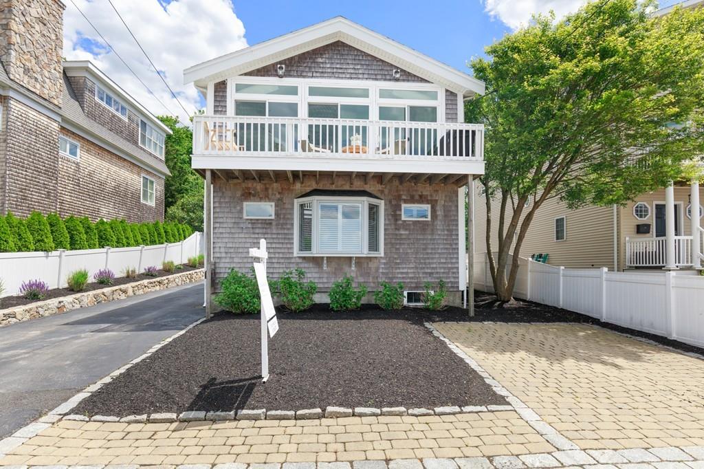 5 Beach Lane Hingham, MA 02043 - Photo 26 of 32 a front view of a house with a yard