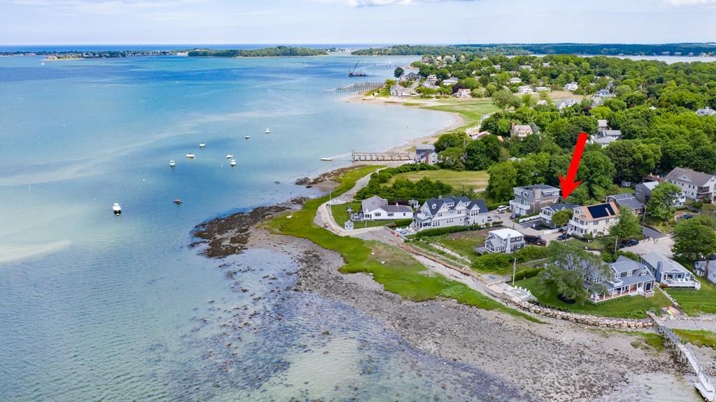 5 Beach Lane Hingham, MA 02043 - Photo 32 of 32 a view of a lake with a mountain in the back