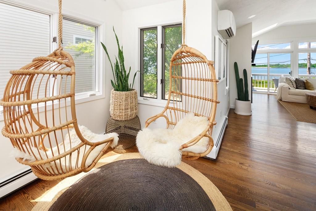 5 Beach Lane Hingham, MA 02043 - Photo 5 of 32 a living room with furniture floor to ceiling window and wooden floor