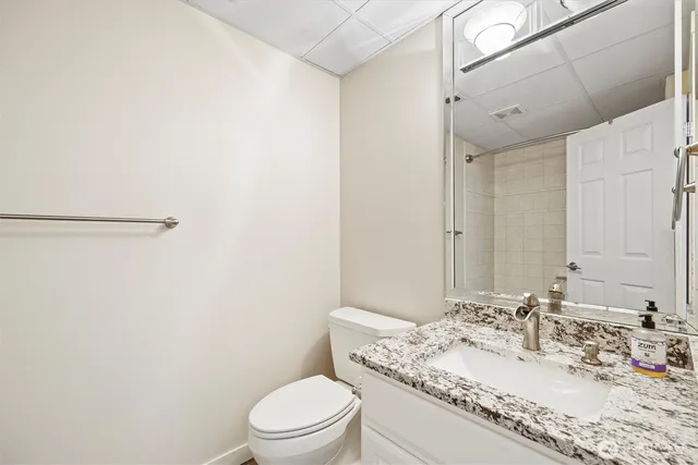 a stove top oven sitting inside of a kitchen