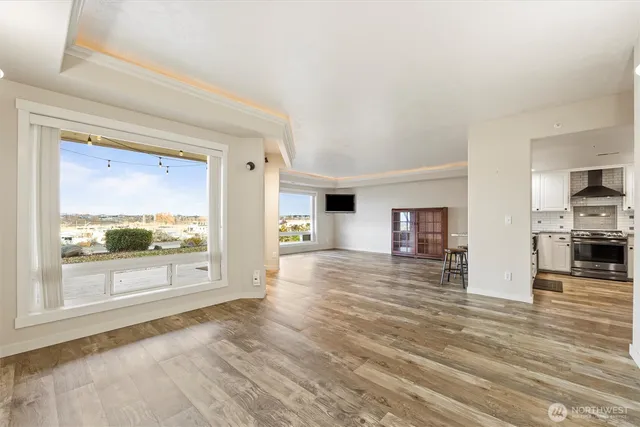 a view of an empty room with a window