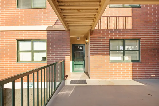 a view of a brick house with a window
