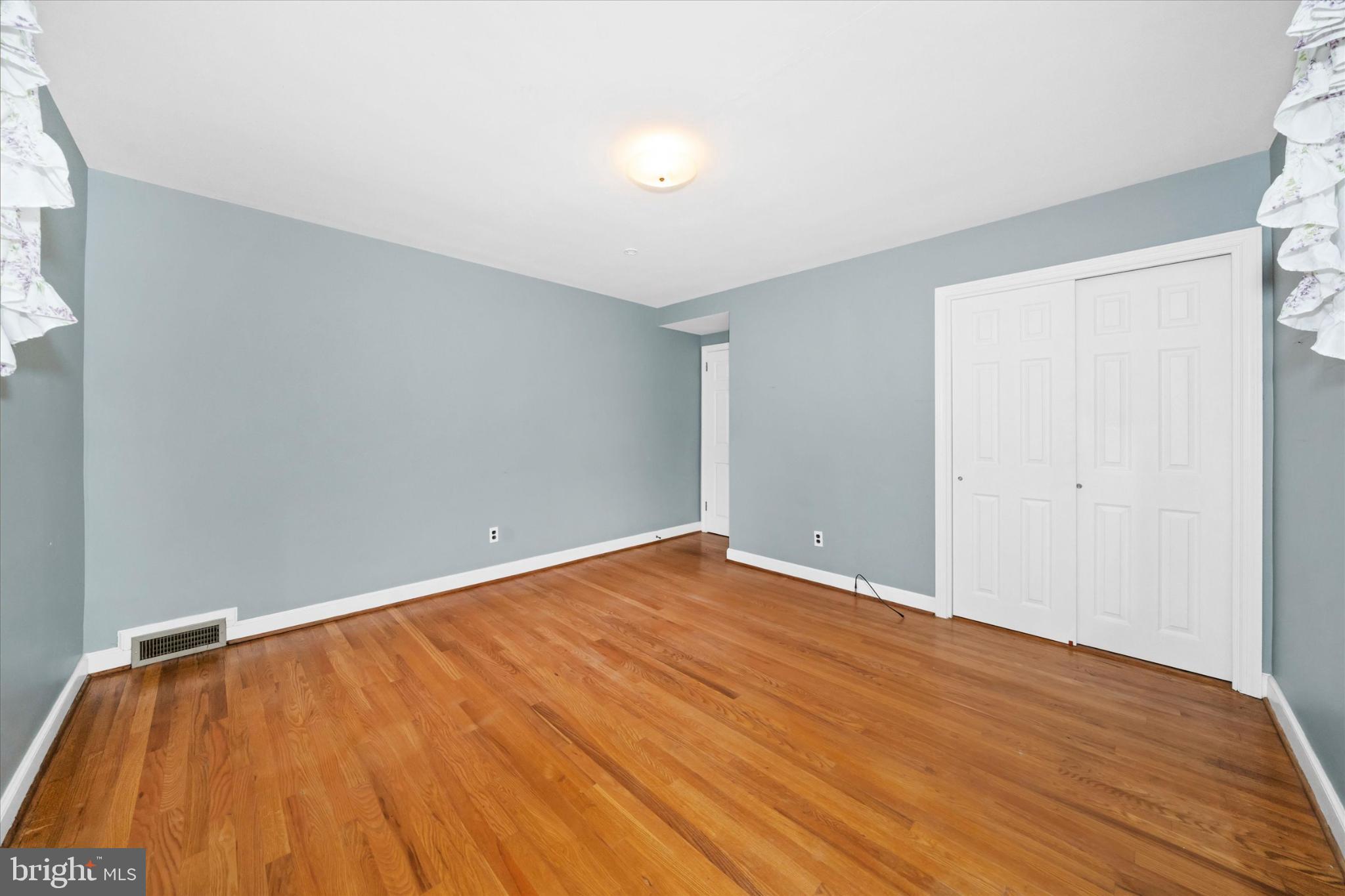 42 Paschall Road Wilmington, DE 19803 - Photo 20 of 41 a view of empty room with wooden floor