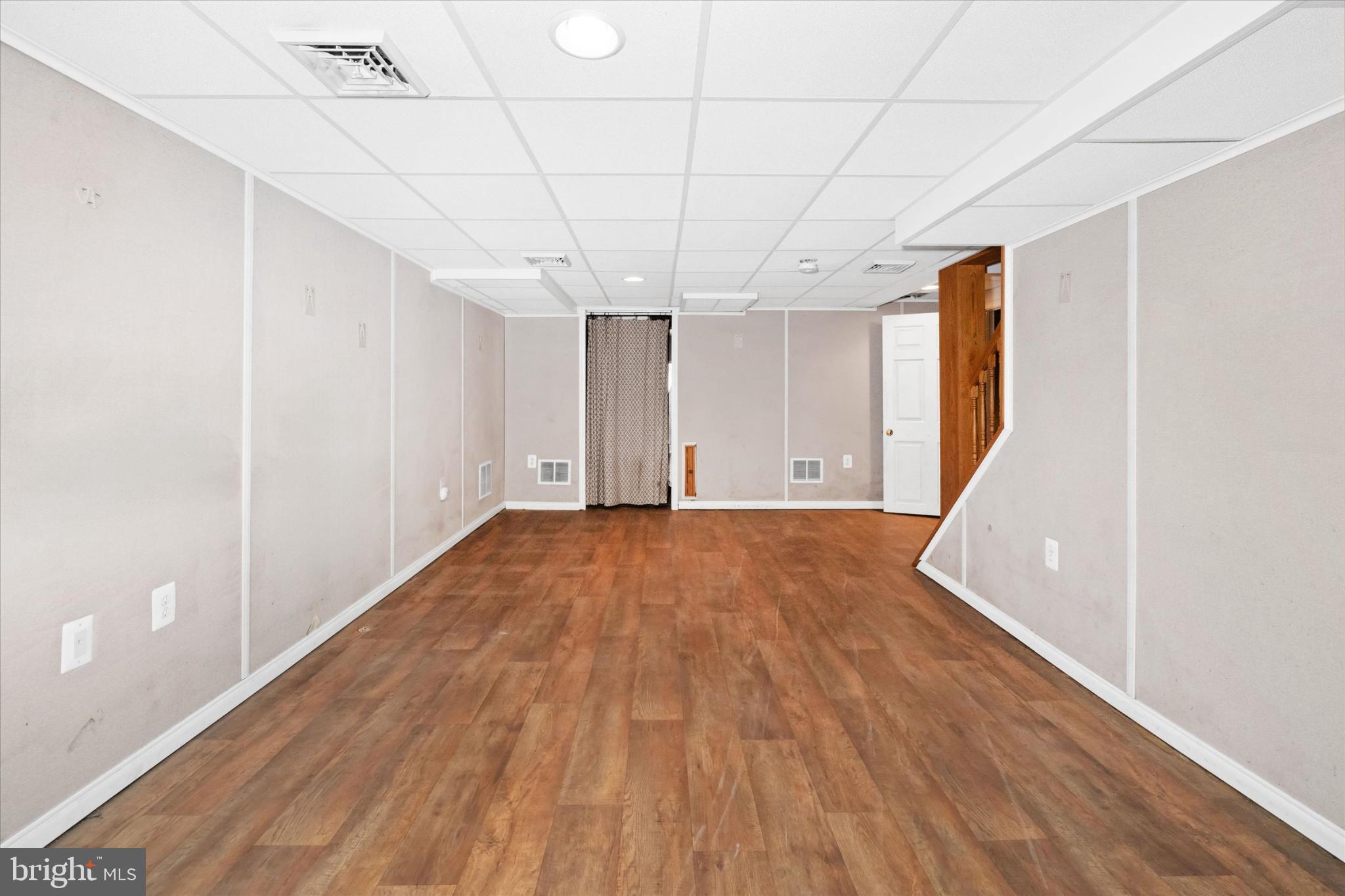 42 Paschall Road Wilmington, DE 19803 - Photo 29 of 41 a view of empty room with wooden floor