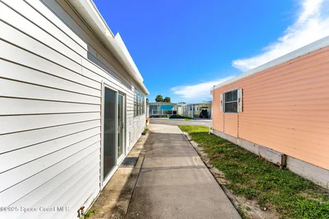 a view of a back yard with a house