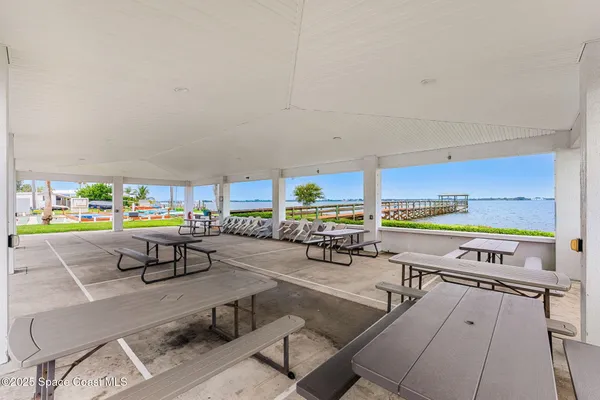 an outdoor space with patio lots of furniture and mountain view