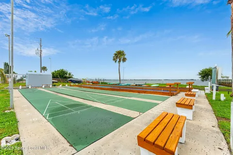 a view of a swimming pool with a lounge chairs