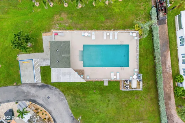 a view of an house with a swimming pool