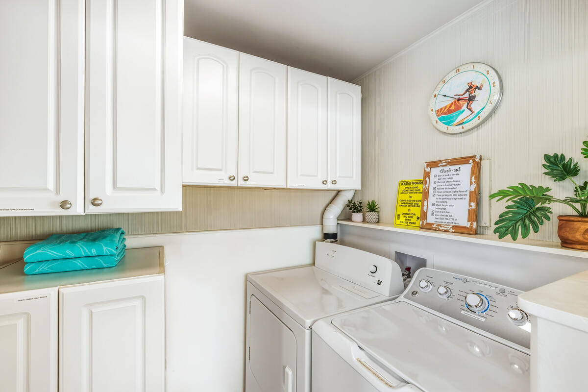 5061 Lawai Road, Unit 402 Koloa, HI 96756 - Photo 20 of 30 a utility room with dryer and washer