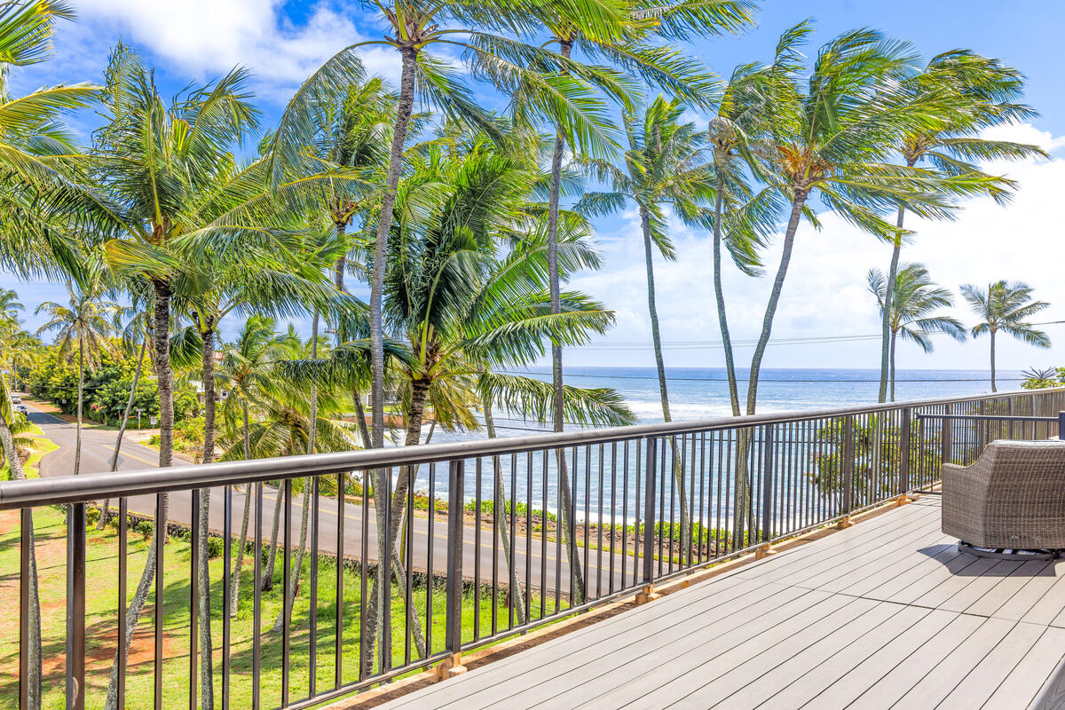 5061 Lawai Road, Unit 402 Koloa, HI 96756 - Photo 2 of 30 a view of balcony with wooden floor and fence