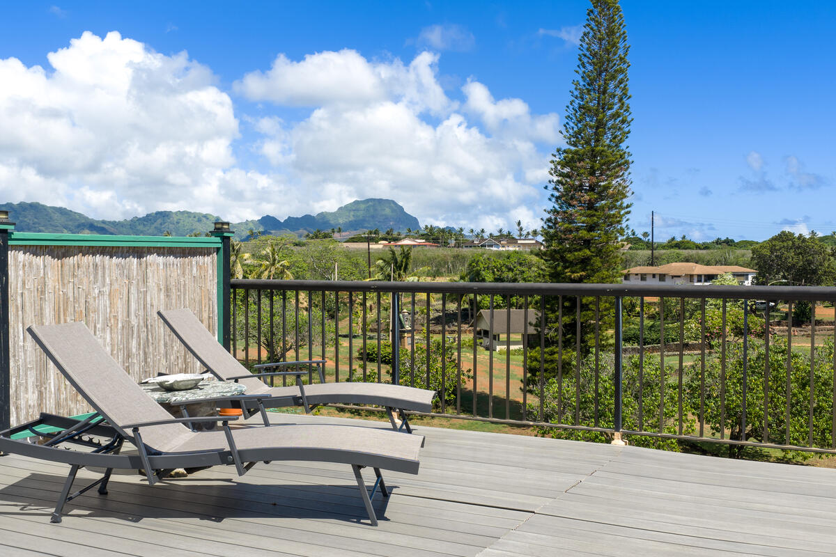 5061 Lawai Road, Unit 402 Koloa, HI 96756 - Photo 21 of 30 a view of a patio with a table chairs