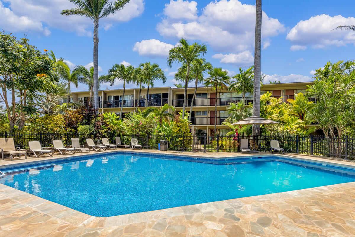 5061 Lawai Road, Unit 402 Koloa, HI 96756 - Photo 24 of 30 a view of a swimming pool with a house