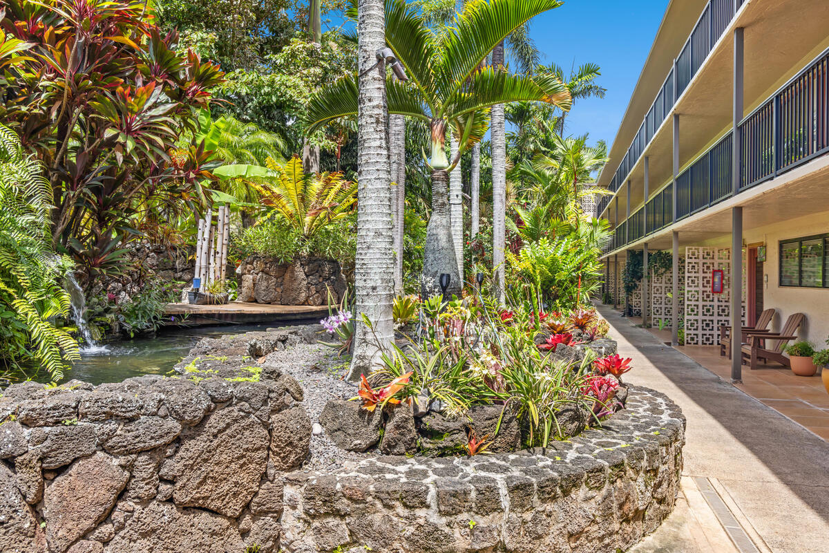 5061 Lawai Road, Unit 402 Koloa, HI 96756 - Photo 25 of 30 a view of a pathway with flower plants