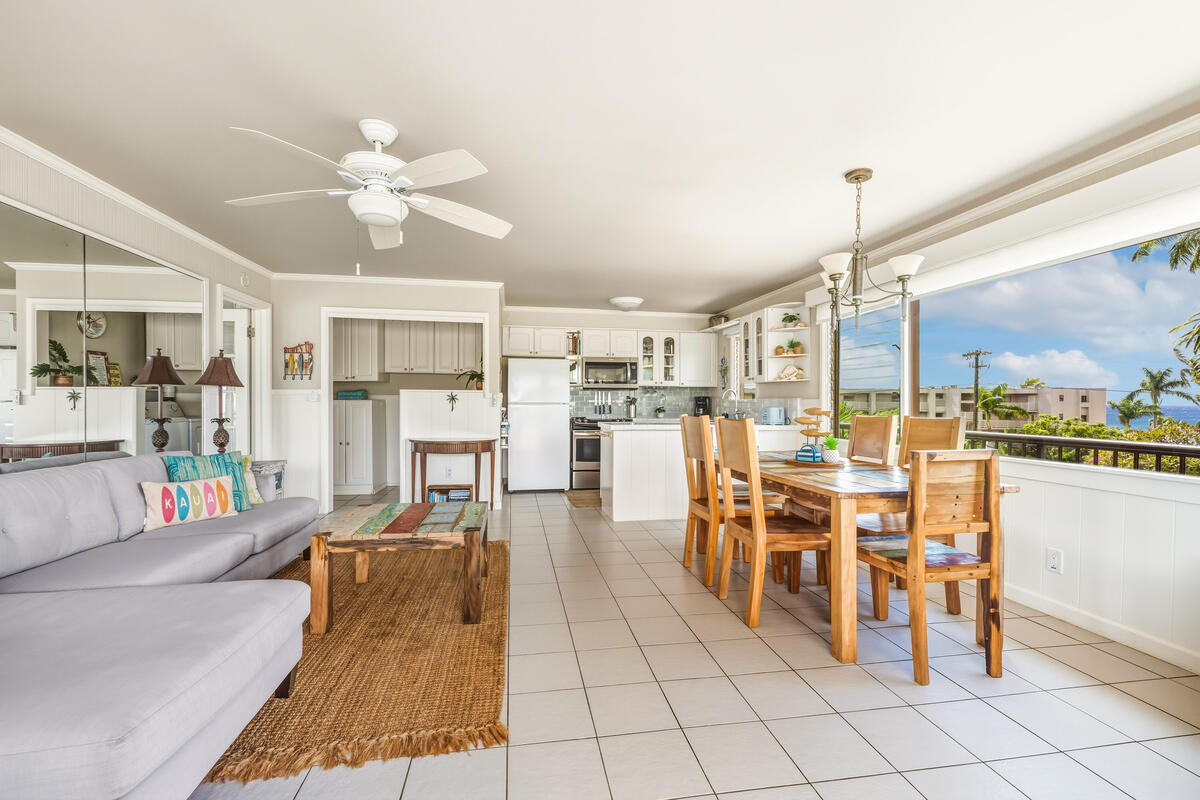 5061 Lawai Road, Unit 402 Koloa, HI 96756 - Photo 4 of 30 a living room with lots of furniture and view of kitchen