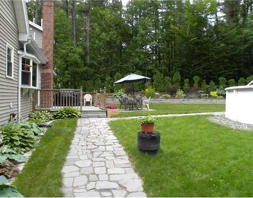 43 Simpsons Beach Road Auburn, ME 04210 - Photo 5 of 29 Yard/Garden. and stone walk ways
